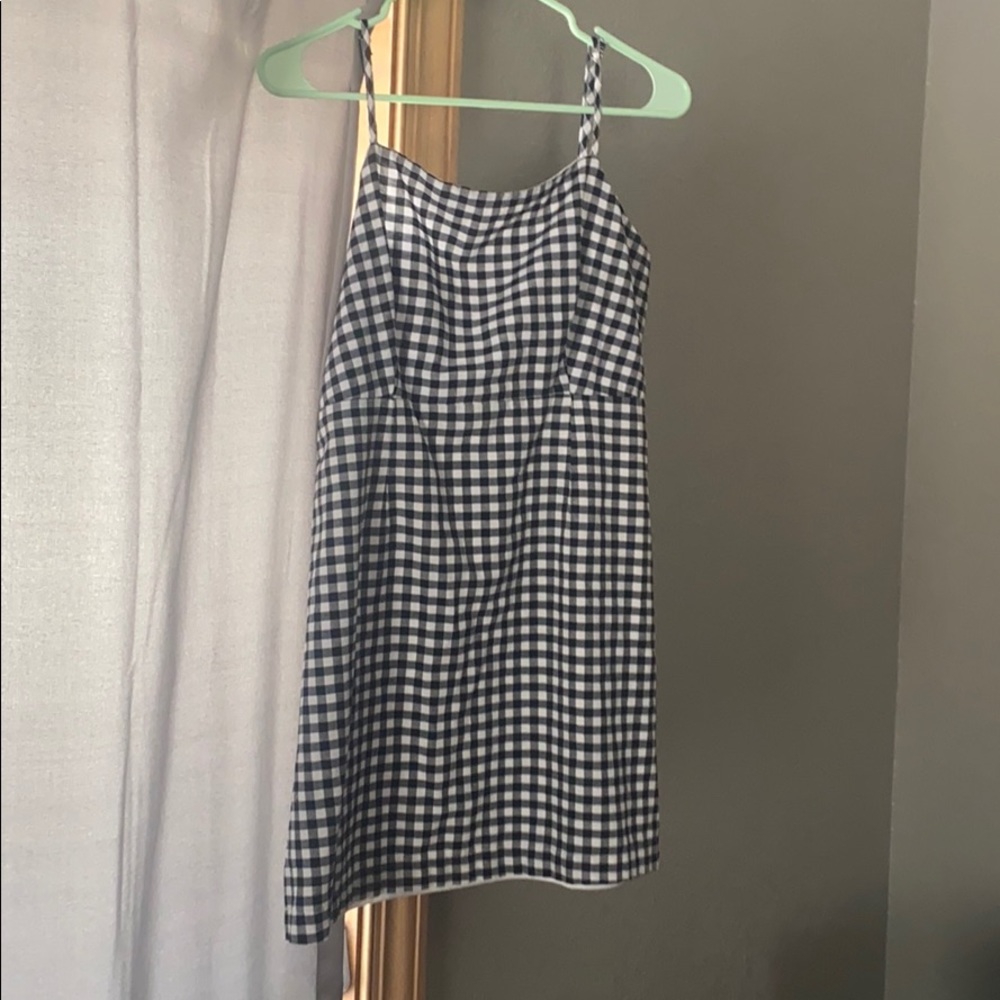 Pacsun checkered dress size(XL) runs very small.